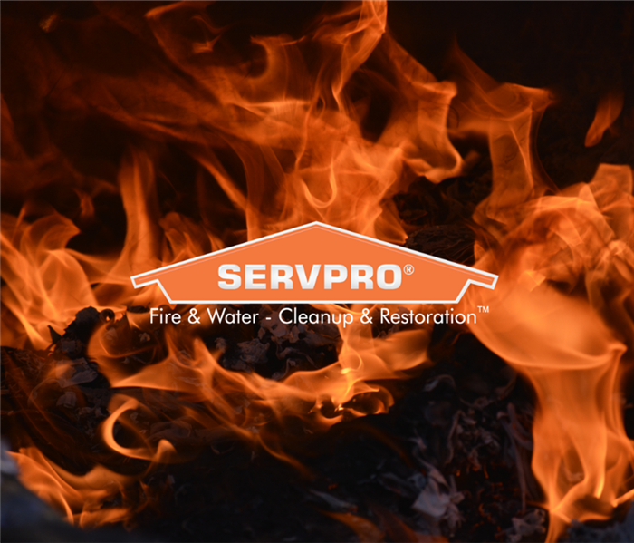 SERVPRO logo with flames in the background.