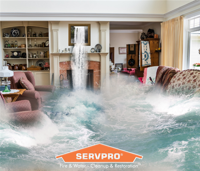 Water flowing out of picture frame into home. SERVPRO logo is present in picture.
