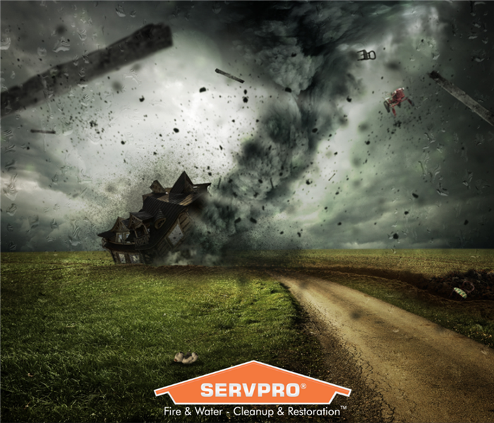 SERVPRO logo with tornado hitting home in background