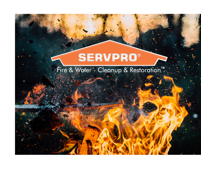 SERVPRO logo with flames in background