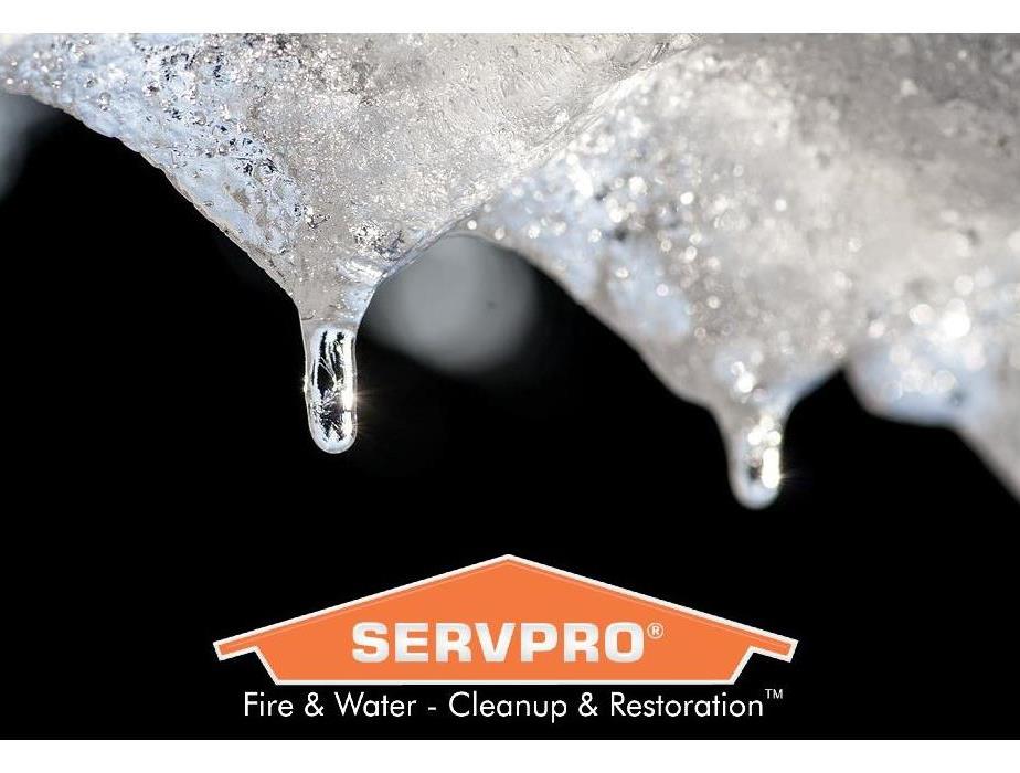 Melting snow with SERVPRO logo