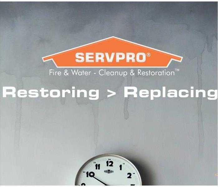SERVPRO logo with clock and restore vs replace.